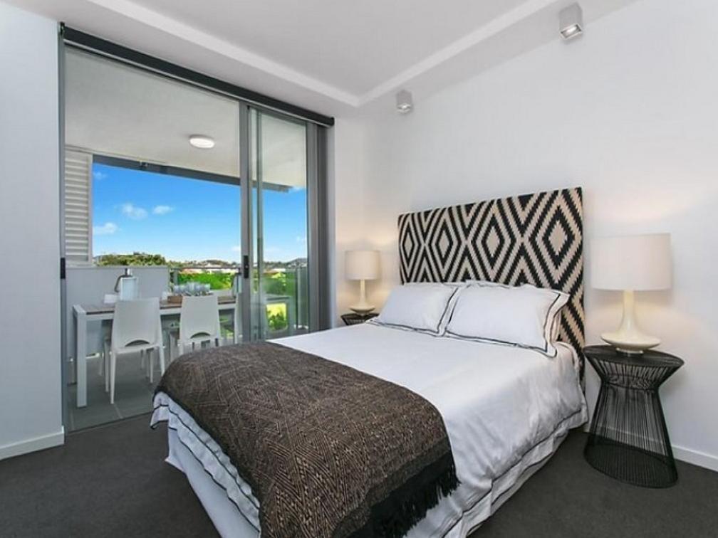 Eastwood Apartamentos Brisbane Exterior foto A bedroom in a typical apartment