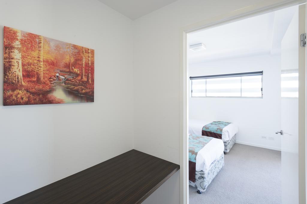 Eastwood Apartamentos Brisbane Exterior foto A bedroom at the new facility