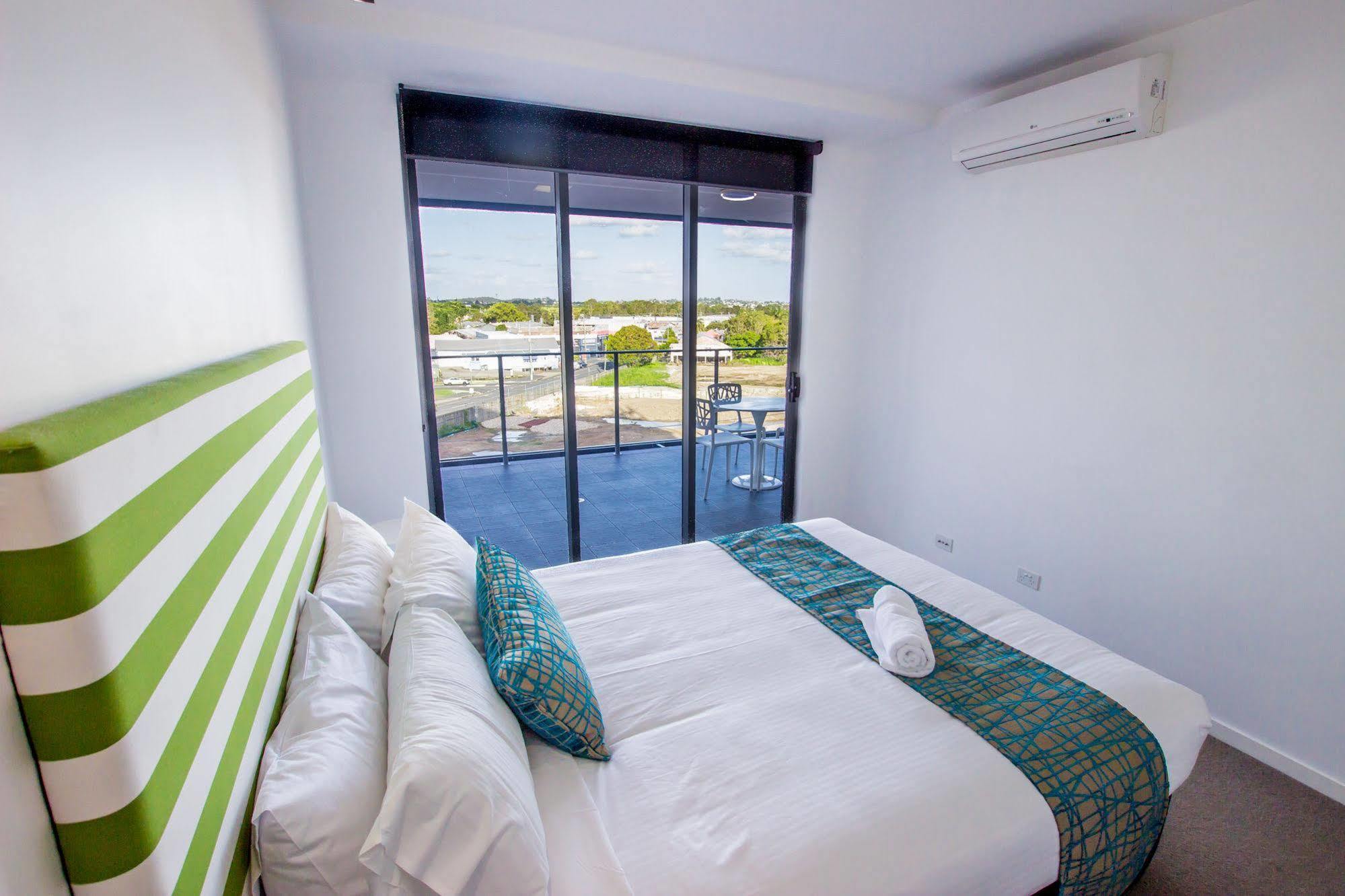 Eastwood Apartamentos Brisbane Exterior foto A bedroom at the hotel
